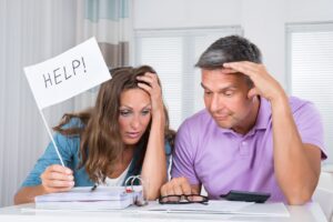 confused couple filing for bankruptcy